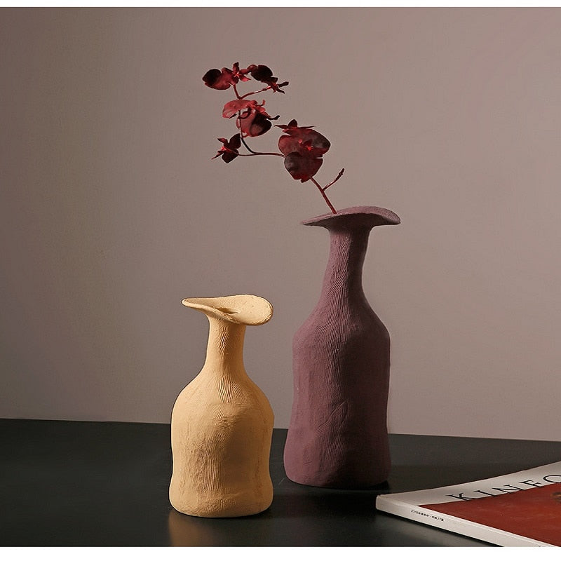 prime clay ceramic disfigured vase flowers